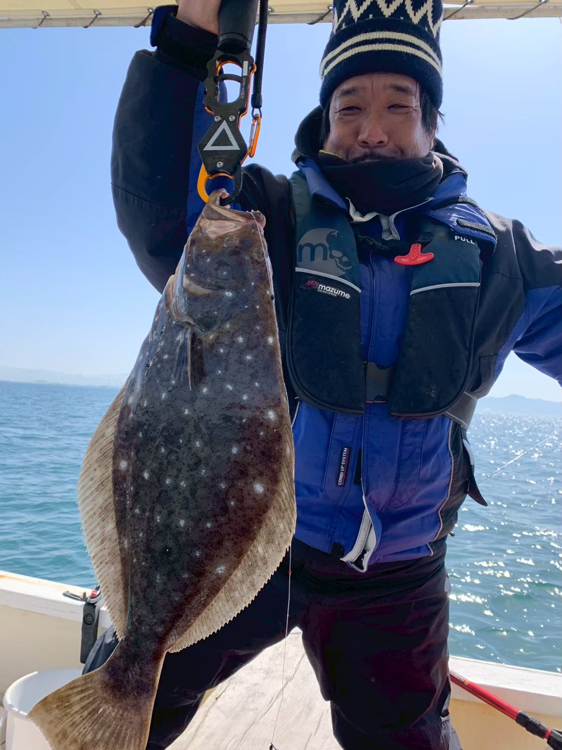 ヒラメ（大物）を釣り上げたお客様