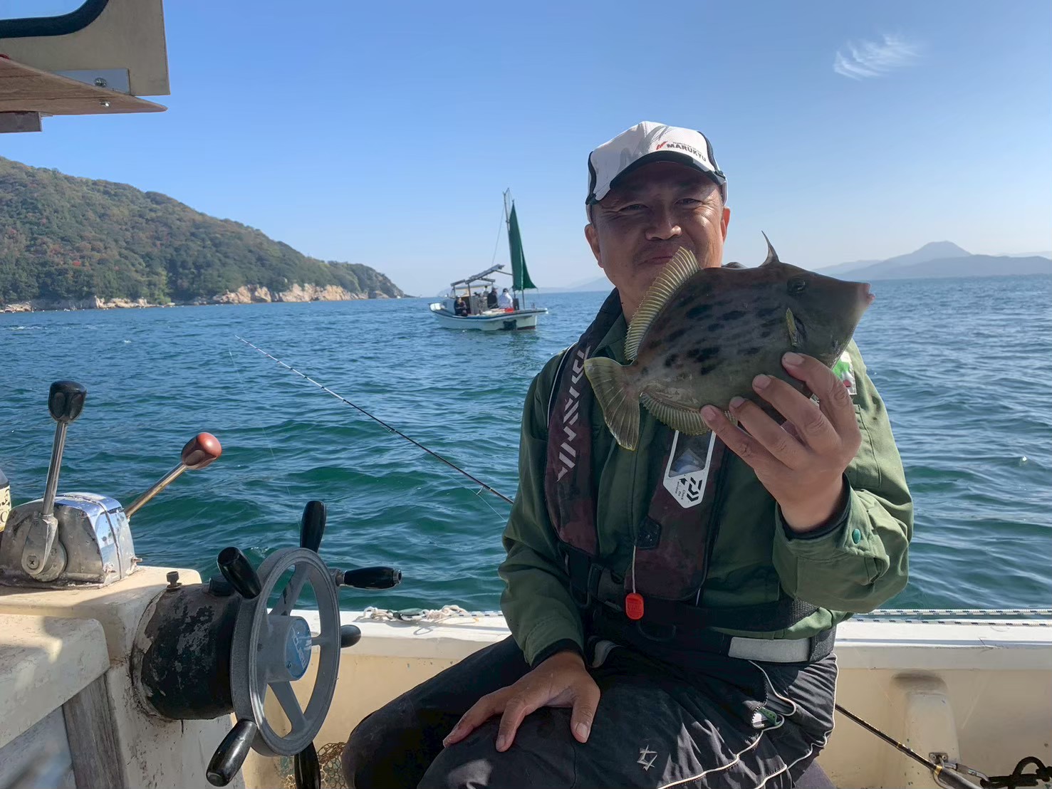 真鯛を釣り上げたお客様